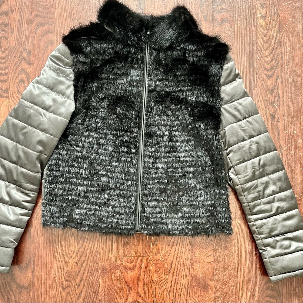 Grey down jacket with a black Rabbit fur front